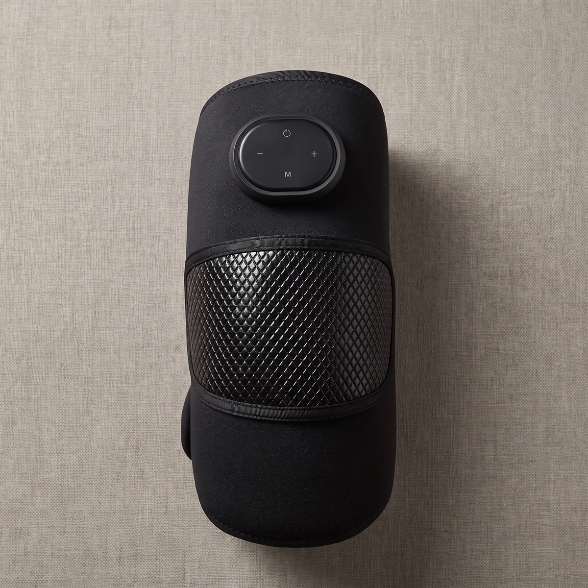 KneeZen matte black knee massager with closed diamond panel and control pod