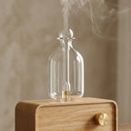 AromaZen diffuser clear glass bottle and nebulizer tube detail