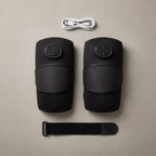 KneeZen knee massager pair with USB-C cable and strap