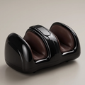 CalfZen glossy black foot and calf massager with PU-leather lined tunnels