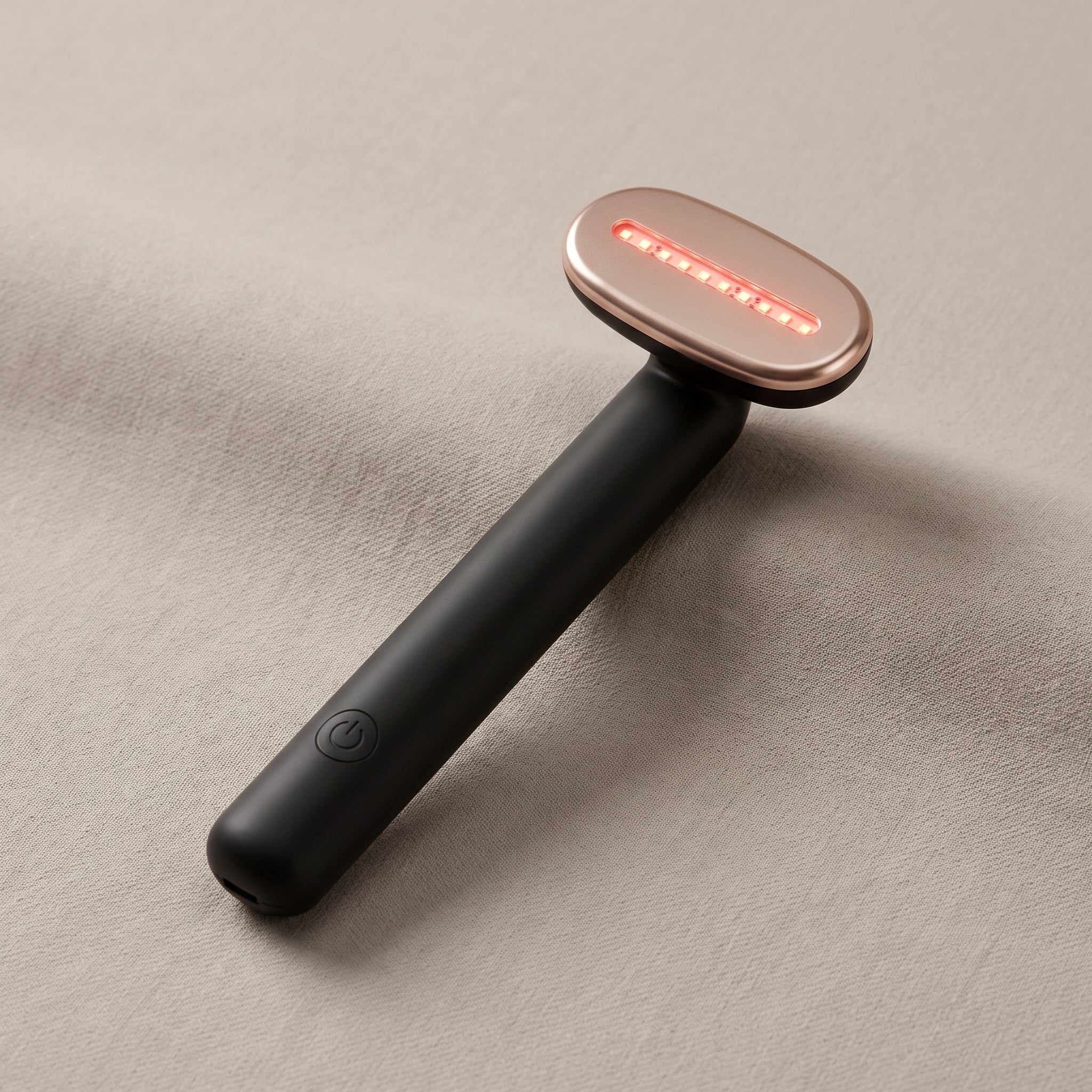 WandZen LED glow face wand with rose-gold red-light head