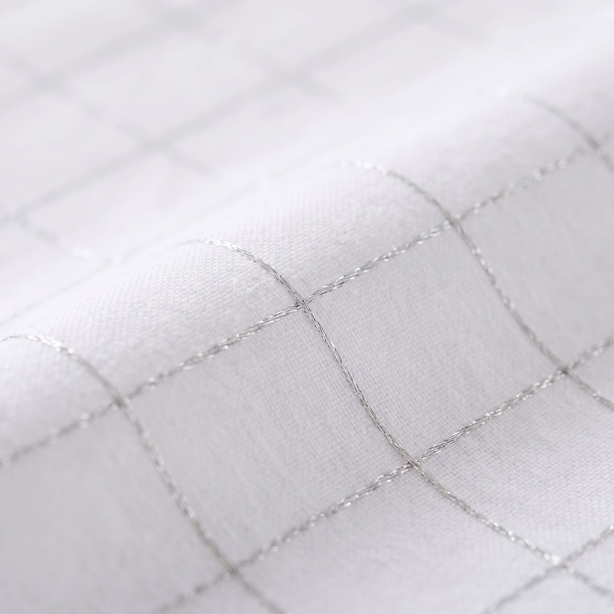 Close-up of the GroundZen conductive silver-fibre grid weave