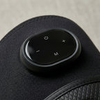 Close-up of the KneeZen oval control pod with power, mode, plus and minus buttons