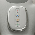 Close-up of the PalmZen chrome control pod with heat, mode, intensity and power buttons