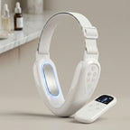 SculptZen white facial band with its handheld remote on a vanity