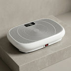VibeZen vibration plate shown at an angle with gray concentric deck and display