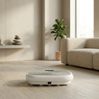 VibeZen vibration plate resting on a wood floor in a calm living room