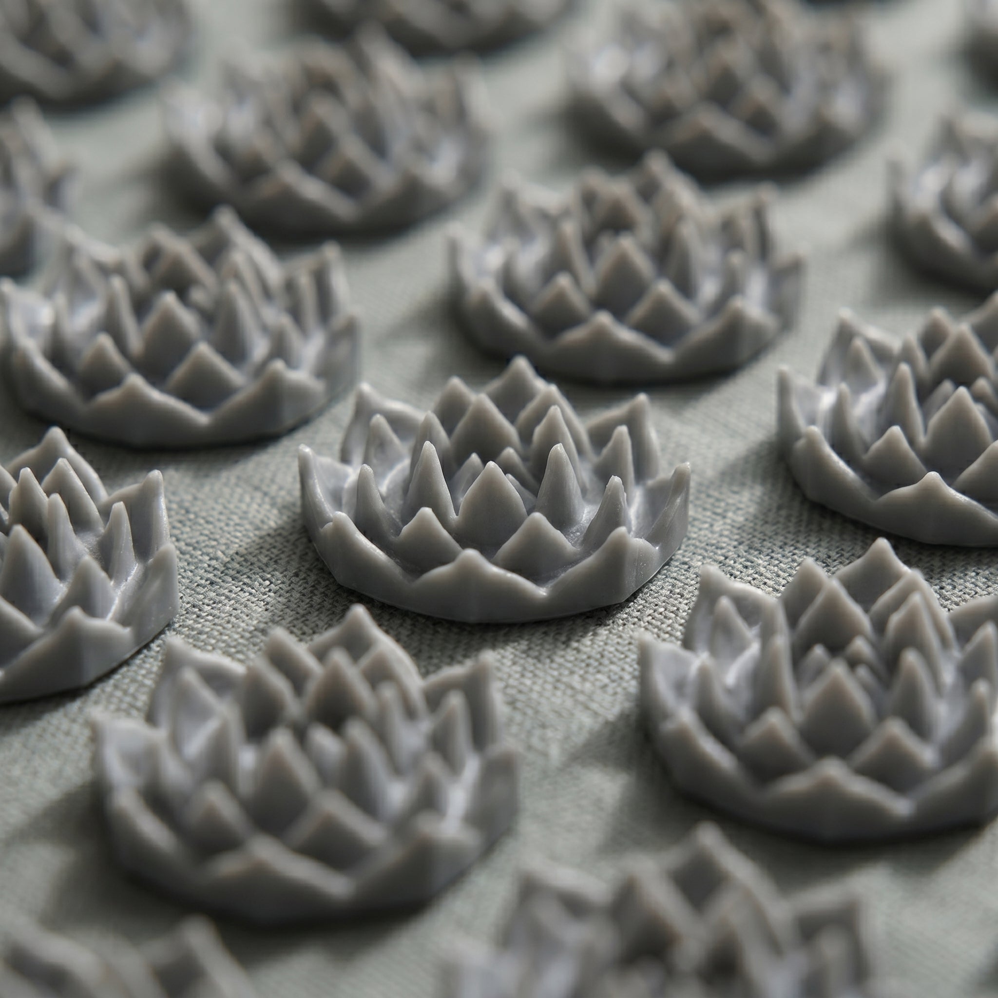 Close-up of the gray lotus spike discs on the AcuZen mat