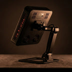 BeamZen red light panel glowing on dark charcoal stone surface evening mood