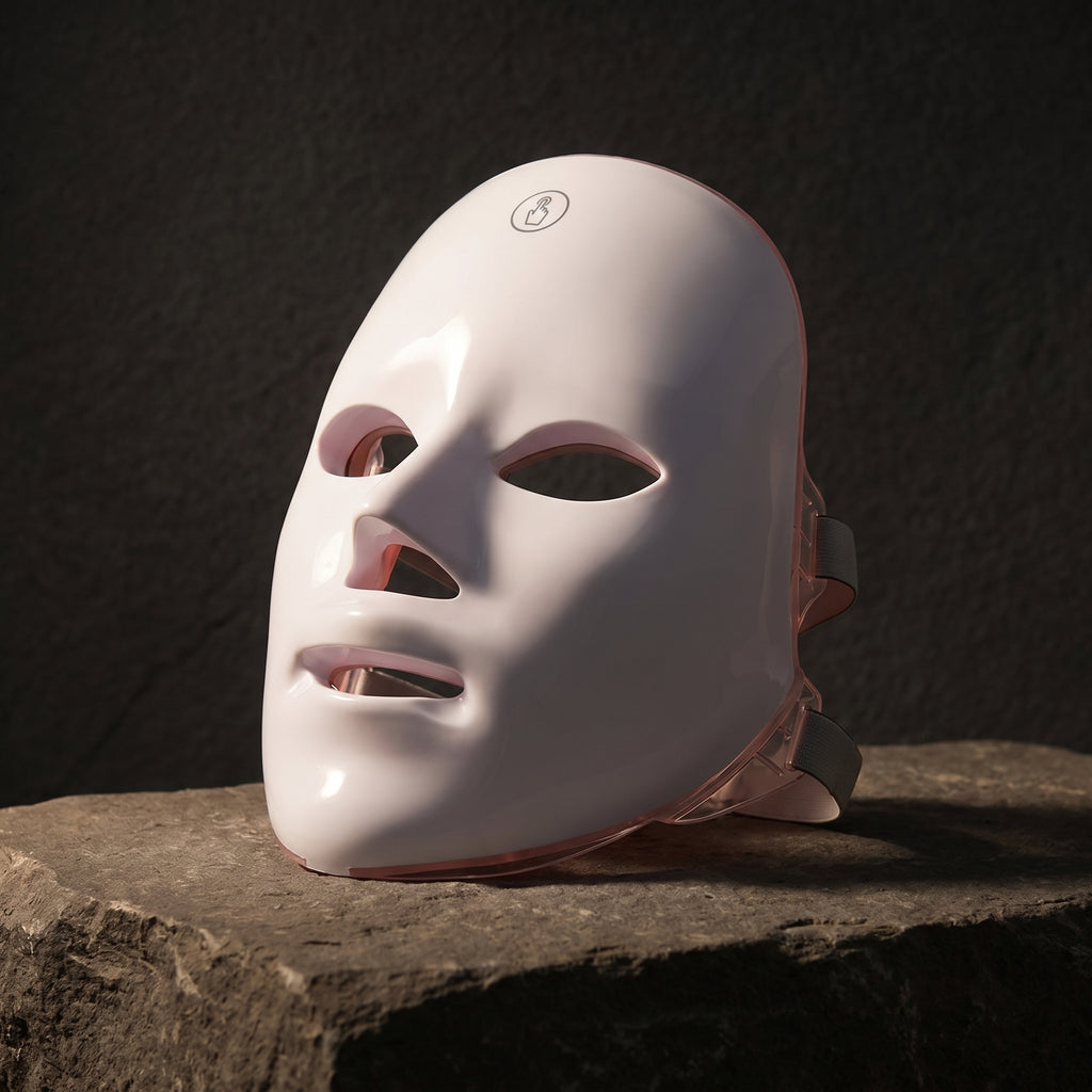 GlowZen LED face mask on dark stone in soft evening light
