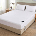 GroundZen white grounding fitted sheet on a freshly made bed