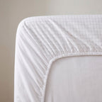 Close-up of the GroundZen elasticated fitted corner and cotton skirt