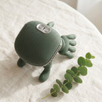 NeckZen neck shoulder massager on cream linen with eucalyptus sprig