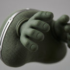 Close-up macro of NeckZen silicone massage fingers and mesh body detail