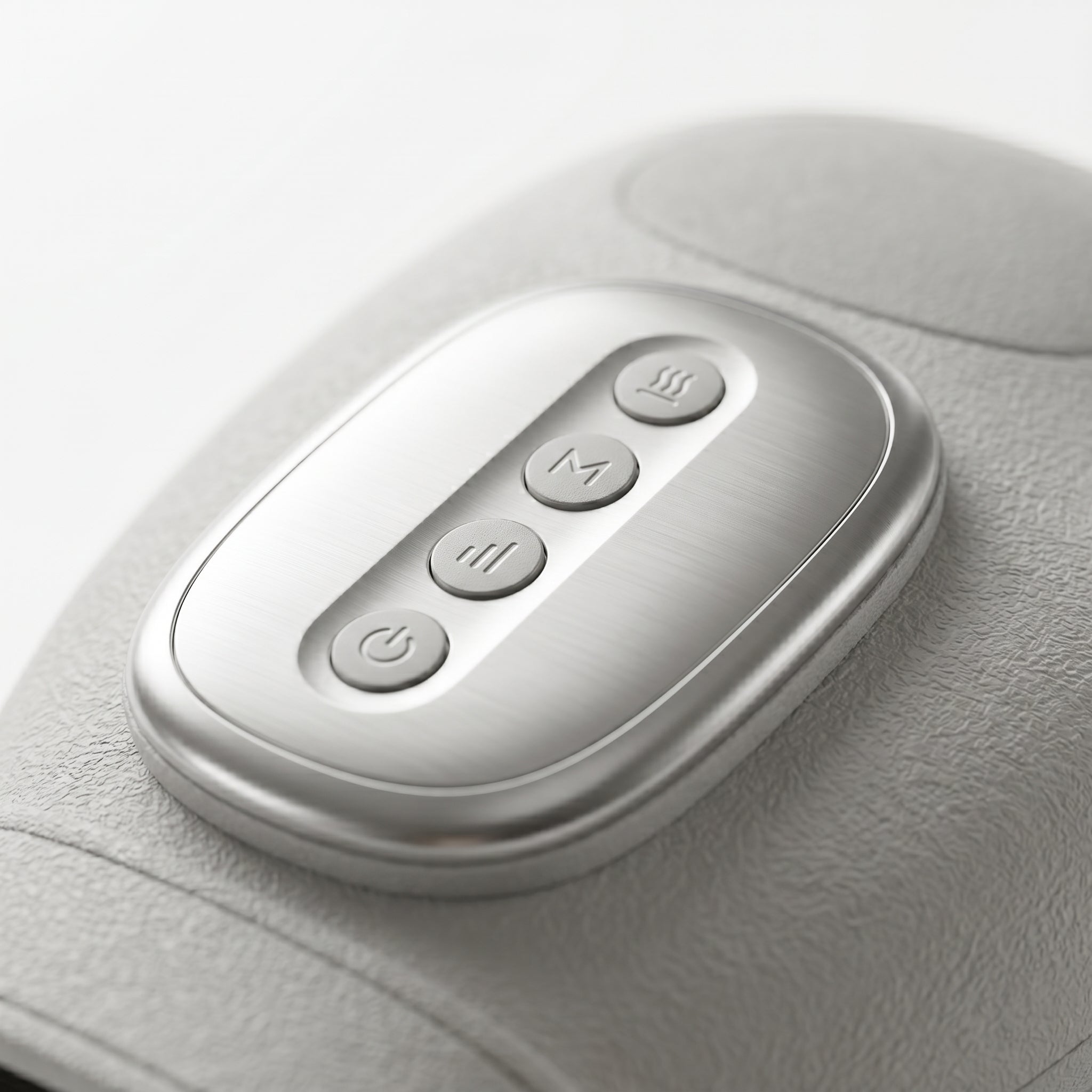Close-up of PalmZen silver control panel showing four round buttons