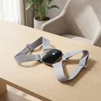 PostureZen trainer resting on an oak desk in a calm home office