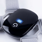 Close-up of the PostureZen power button and blue digital display