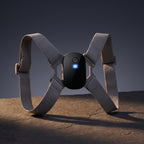 PostureZen trainer on dark stone with a softly glowing display