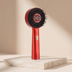 RelaxZen red light scalp comb upright on travertine pedestal studio light