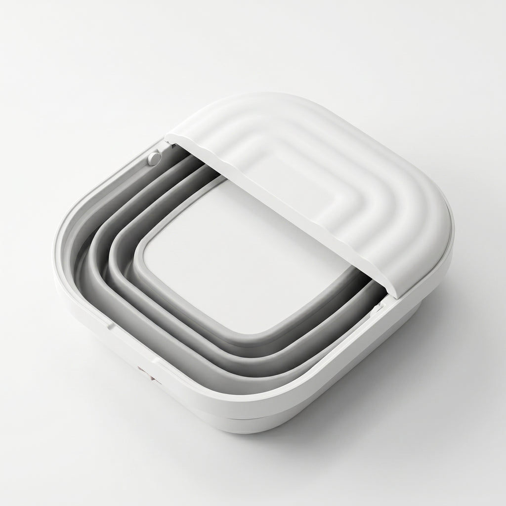 SoakZen foot spa shown partially folded flat on a white surface