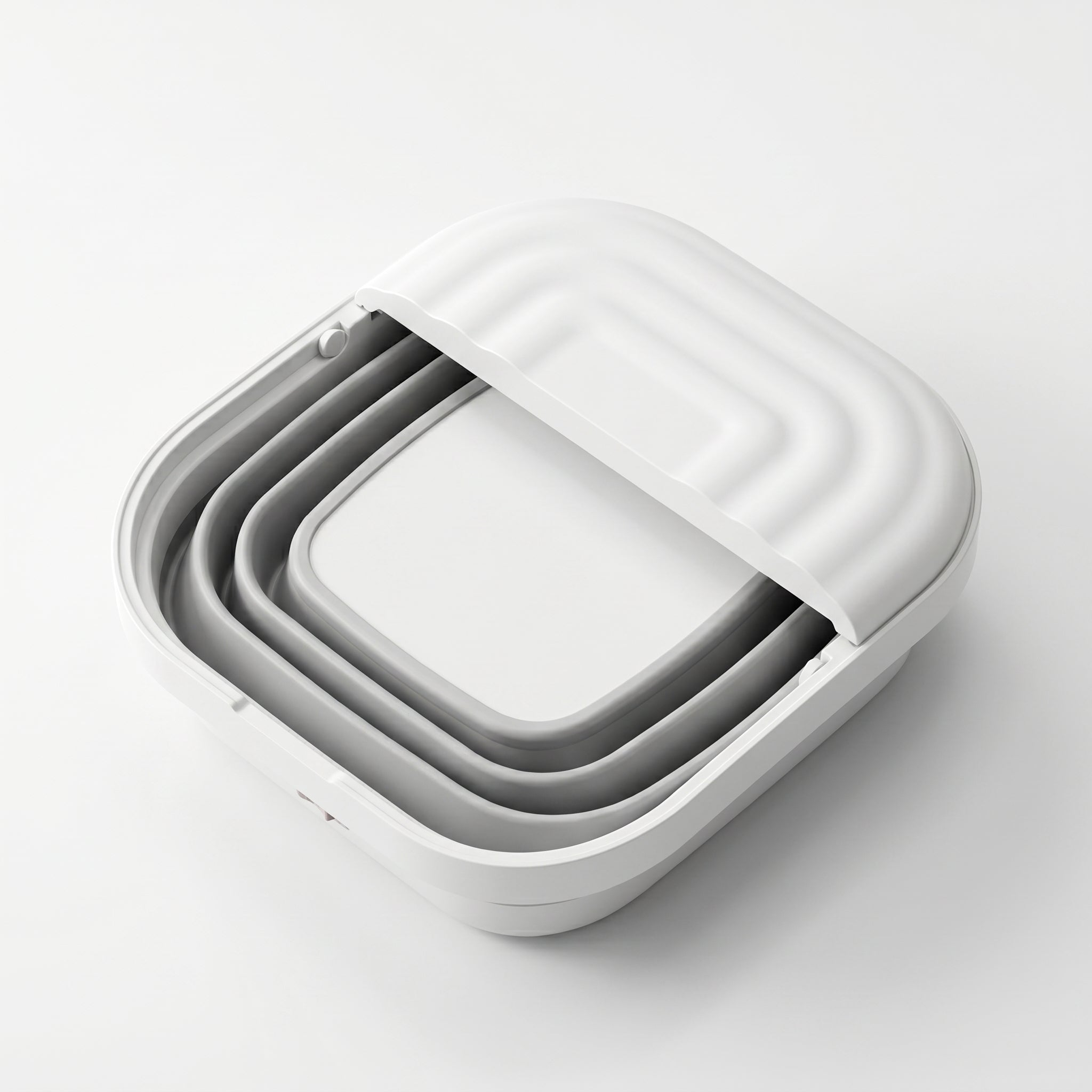 SoakZen foot spa shown partially folded flat on a white surface