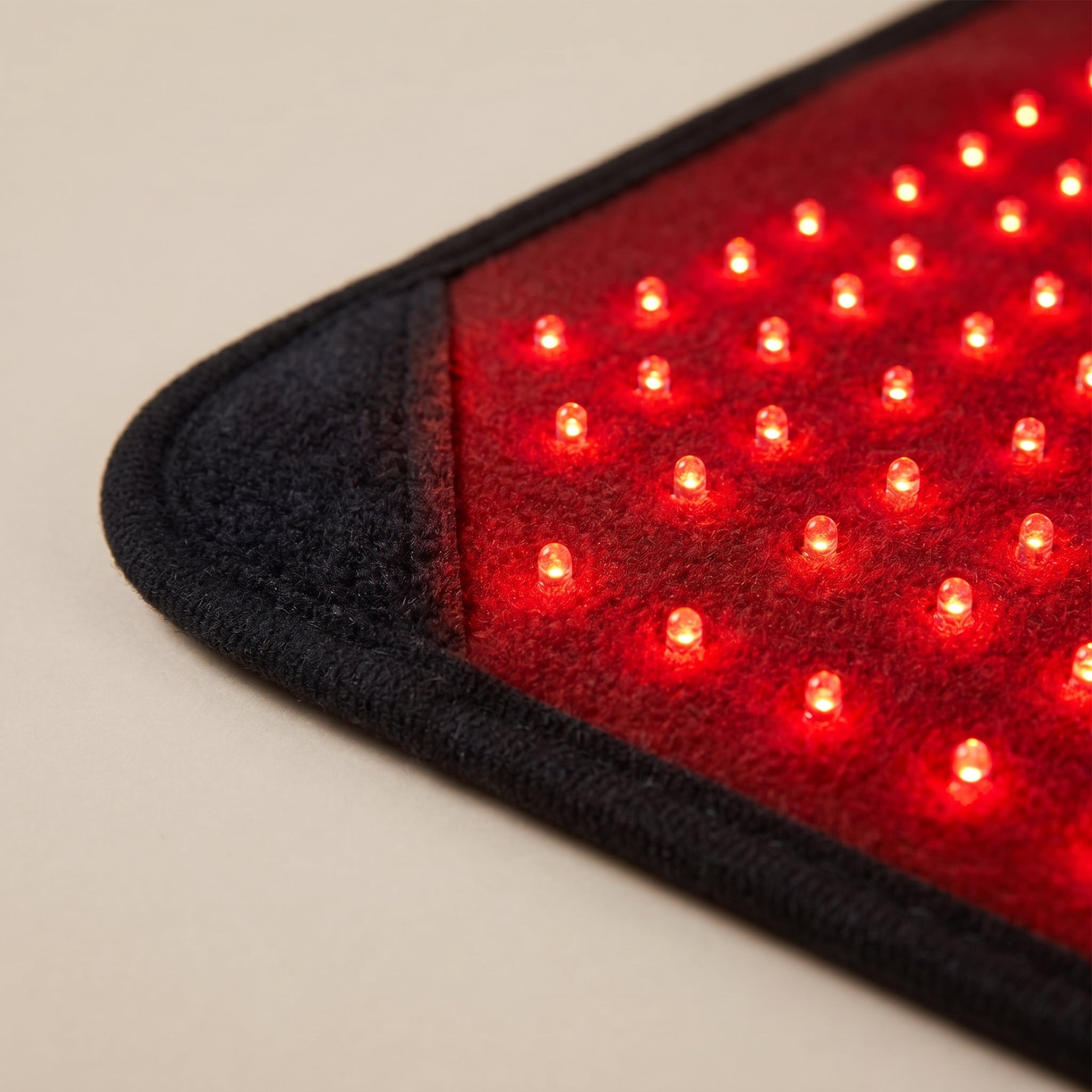 Close-up of the ThermaZen pad corner and its red LED rows