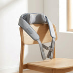 WrapZen neck and shoulder wrap draped over the back of a light oak chair